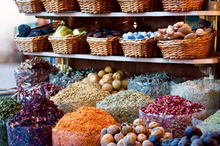 An image depicting various sources of adaptogens, such as herbs, roots, and powders, artfully arranged in woven baskets. The assortment showcases a diverse selection of natural ingredients known for their adaptogenic properties, promoting balance and wellness.